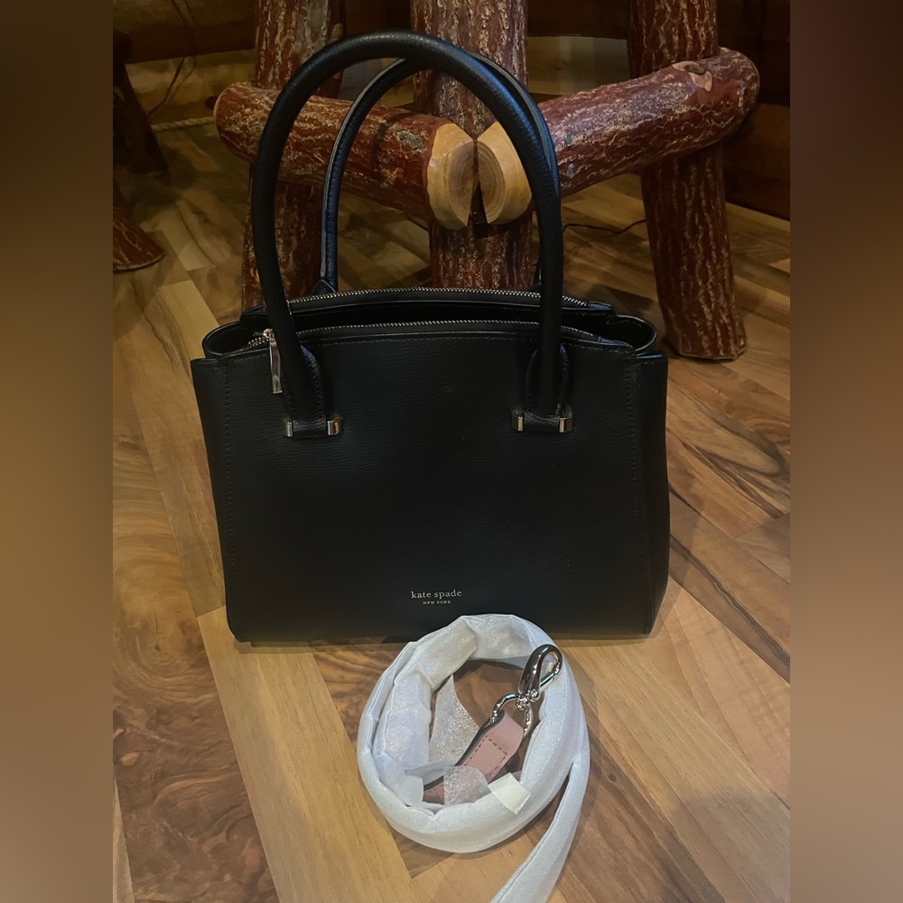 Kate Spade black hand bag with rose pink strap